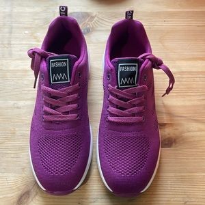 Size 9 Women’s purple athletic shoes, never been worn.